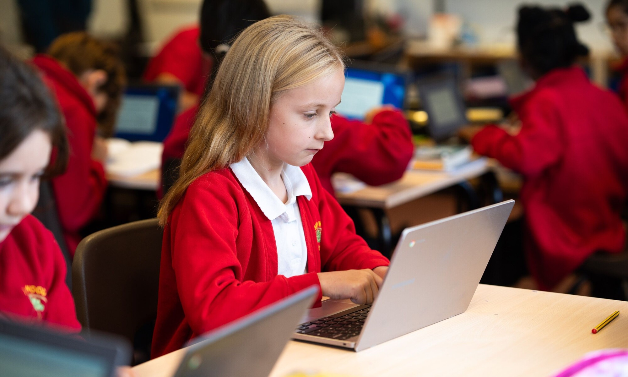 Alban Wood Infant pupils working on chromebooks