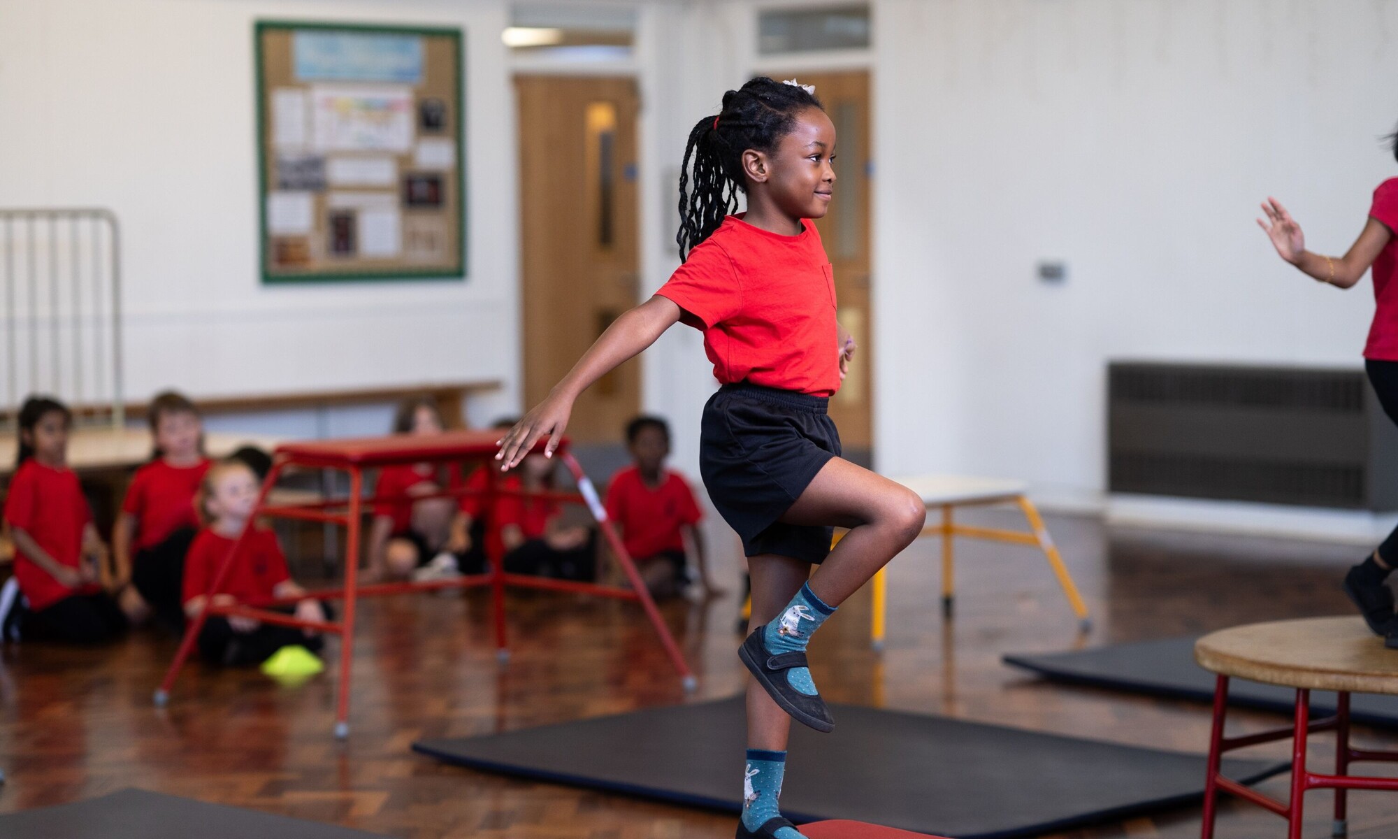 Alban Wood Infant pupil balancing during PE lesson