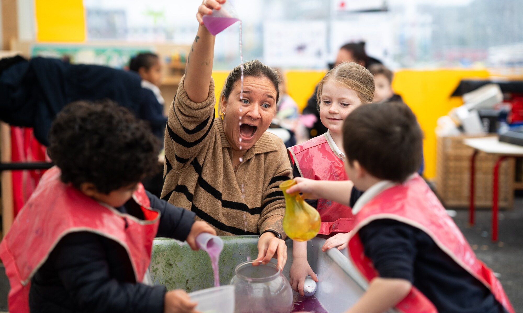 Oxhey Wood Primary School Teacher with Students at Water Table