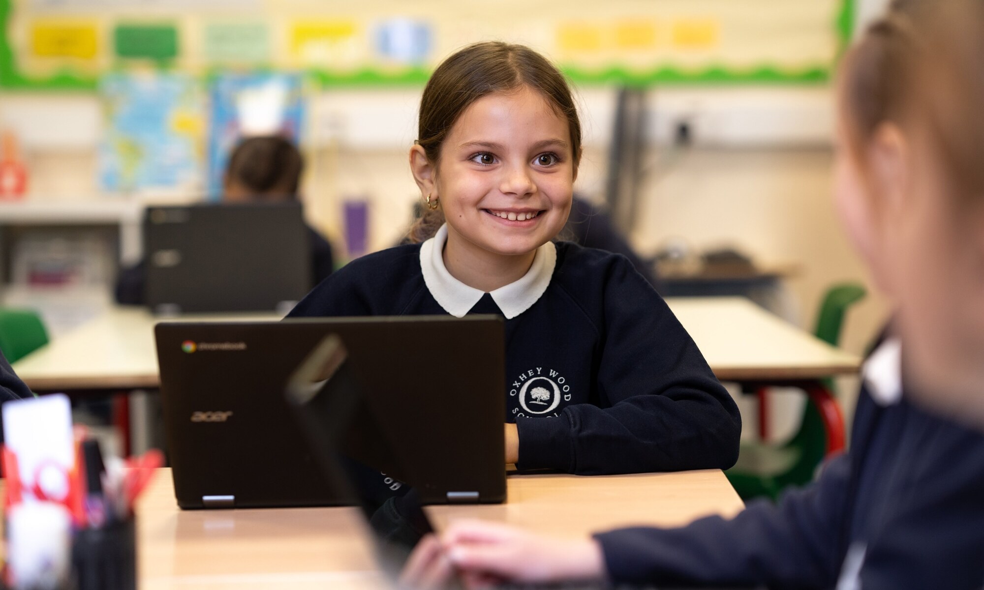 Oxhey Wood Primary School Student in ICT class