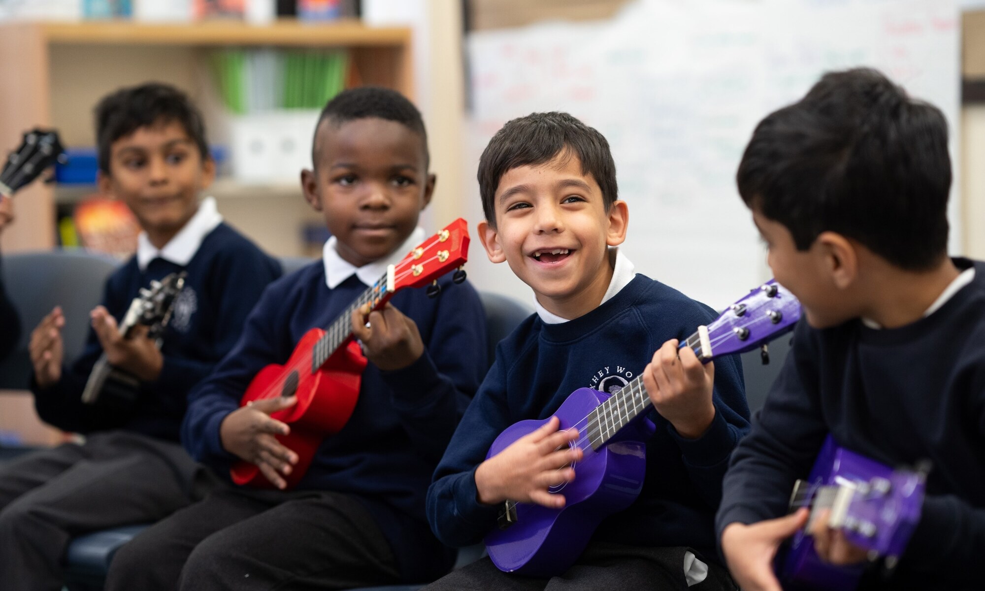 Oxhey Wood Primary School Student Playing the Guitar
