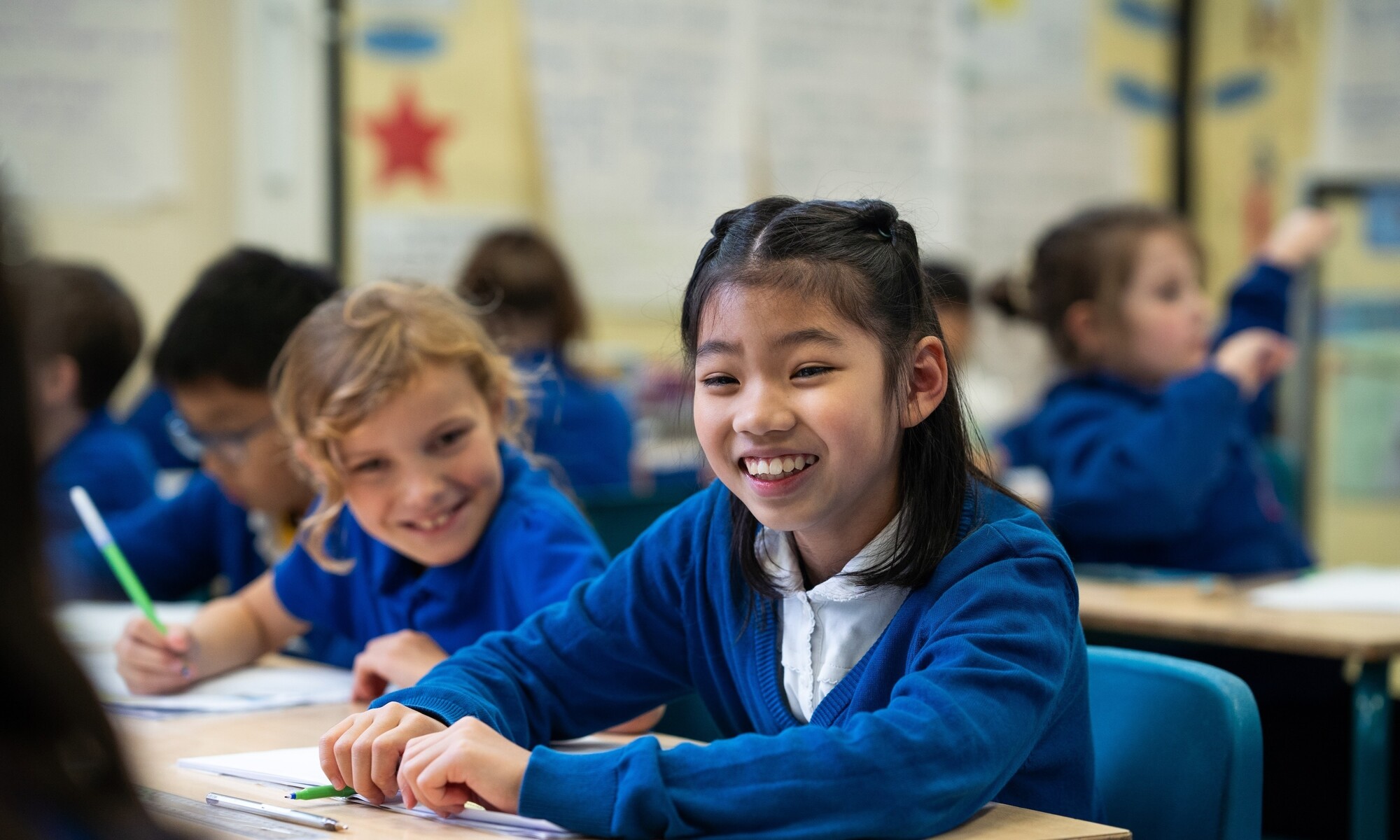 Warren Dell Primary School pupils discussing their work