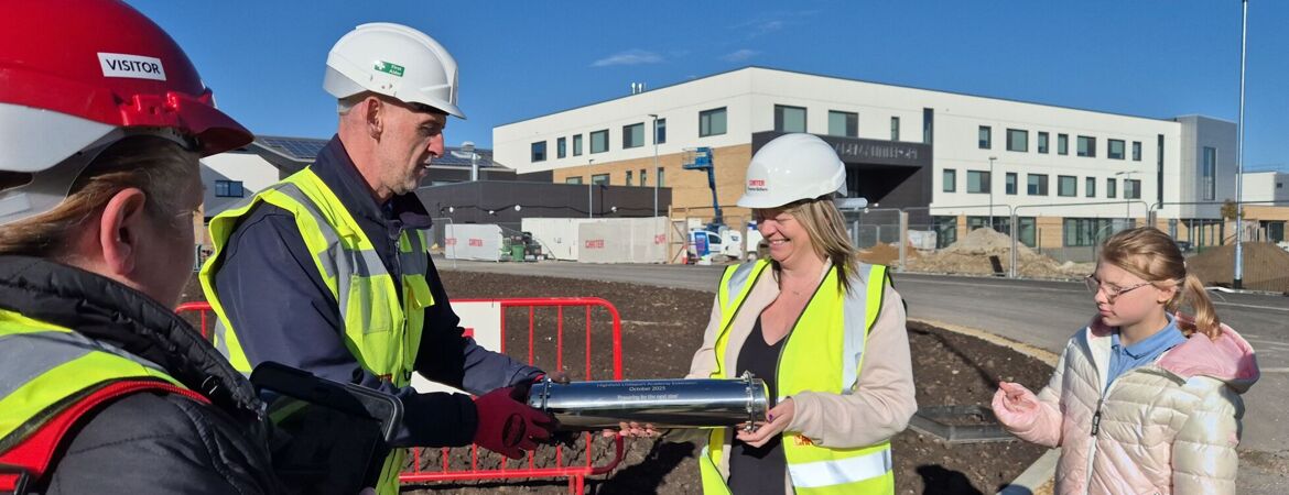 Pupils bury time capsule at Highfield Littleport Academy