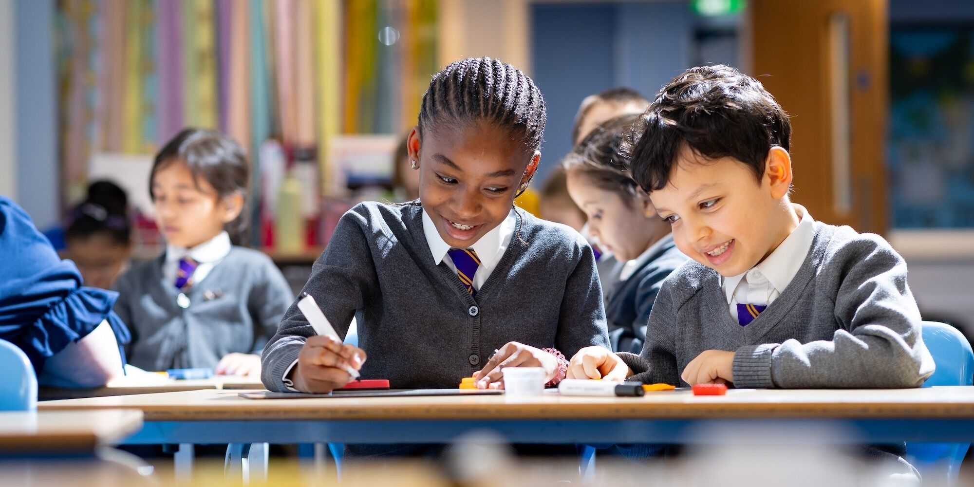 Belmont Castle Academy pupils in an art lesson