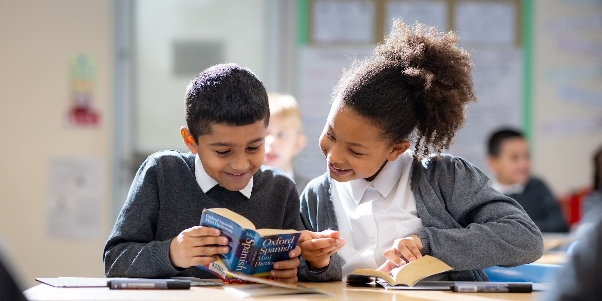 Belmont Castle Academy pupils reading together