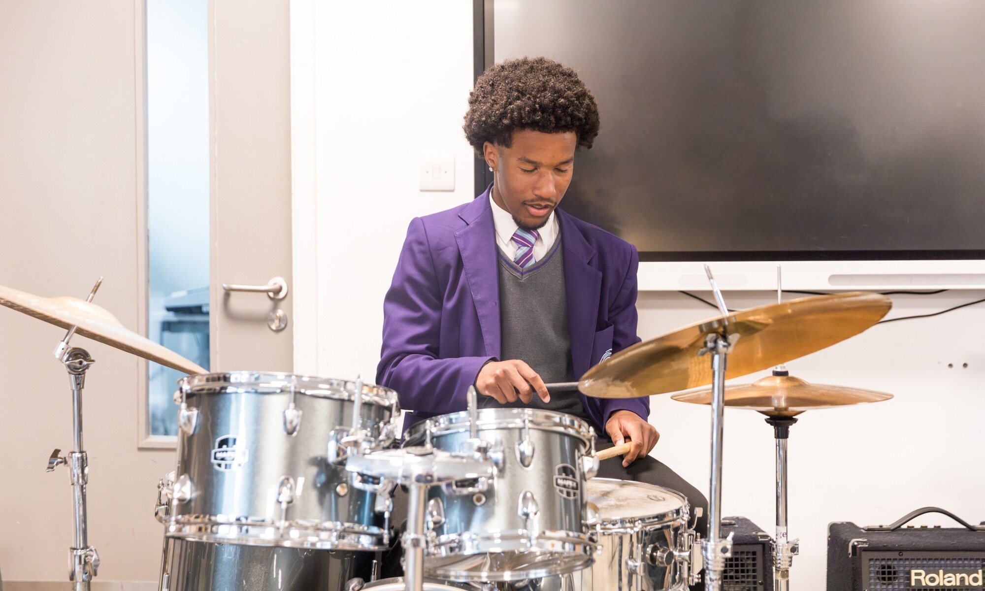 The Bridge Academy pupil in a drum lesson