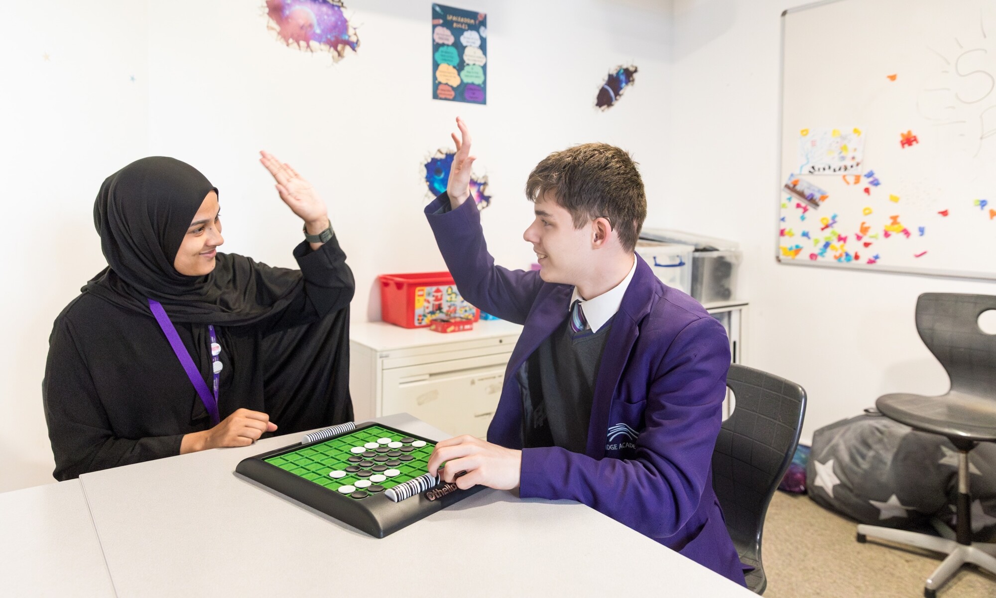 The Bridge Academy pupils playing a board game