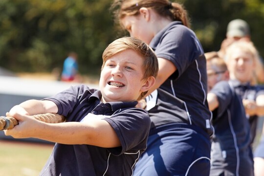 Students participating in tug of war