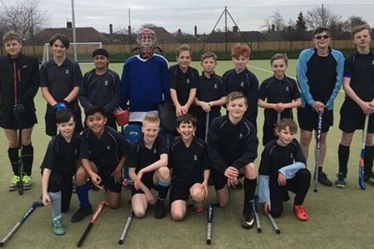 Students celebrating a hockey win