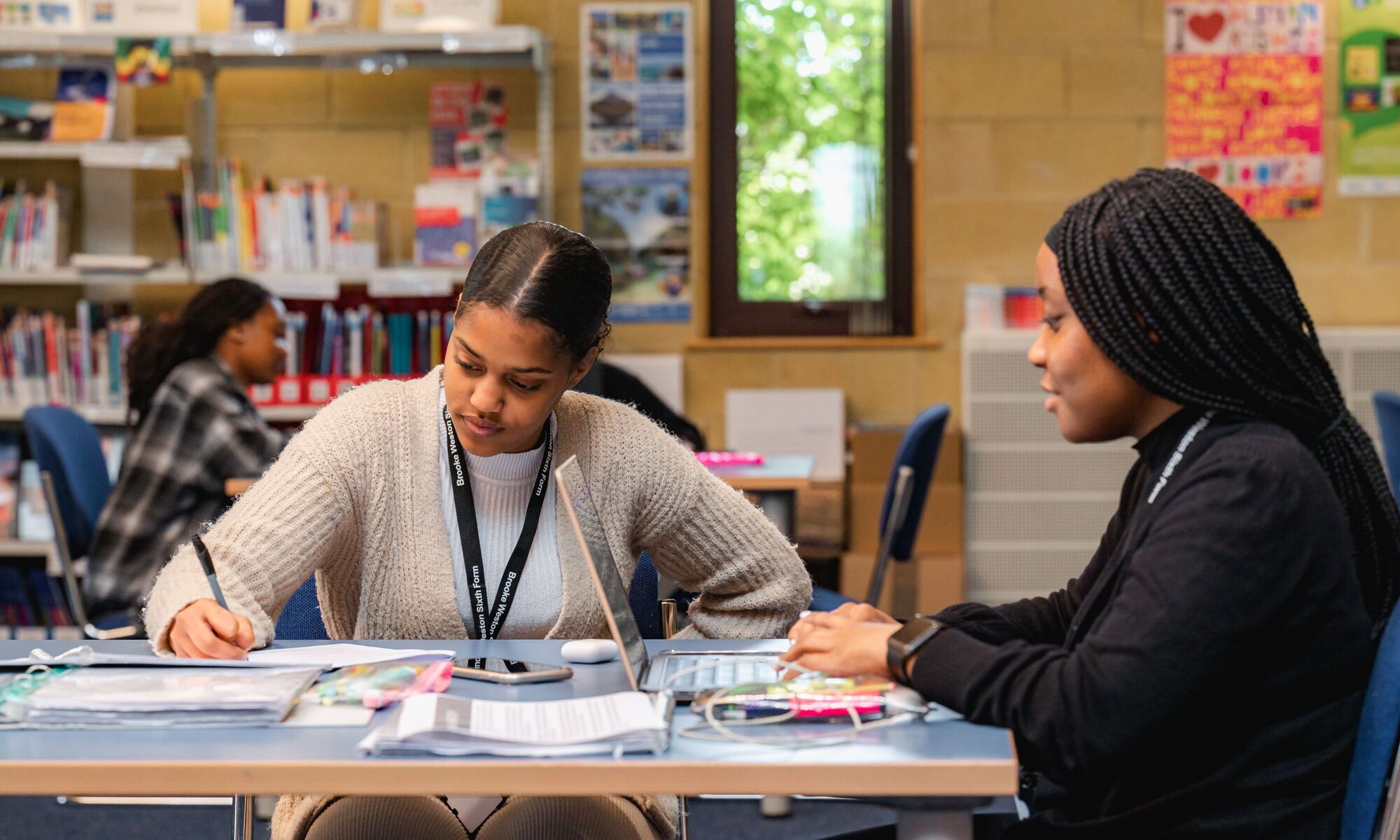 Brooke Weston Trust sixth form pupils in the library