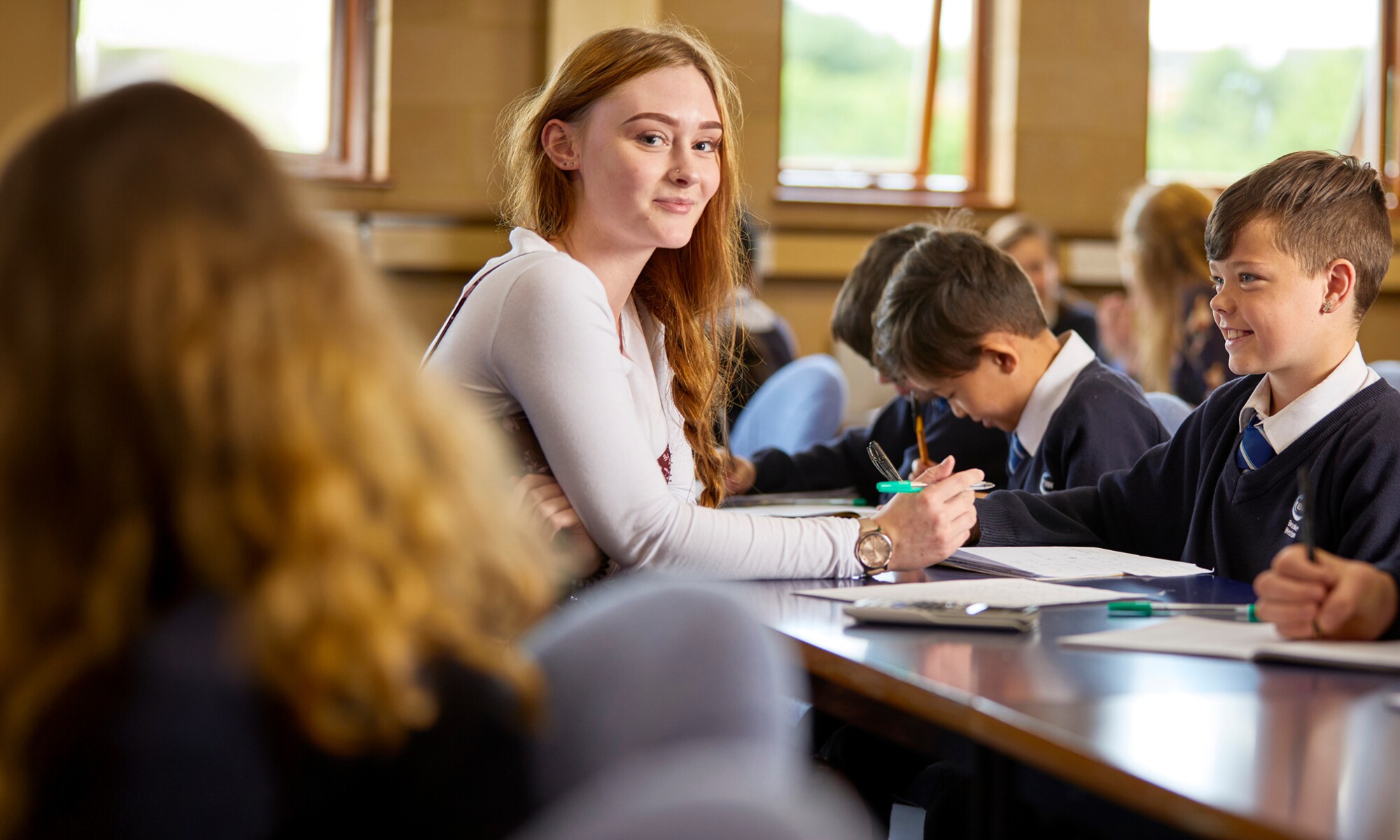 Brooke Weston Trust staff helping pupils
