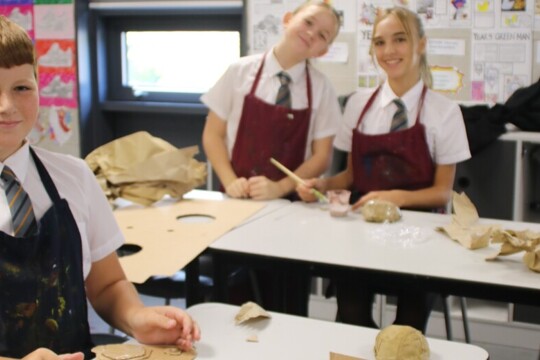 Corby Technical School - Three students in an art club