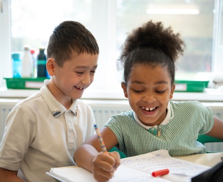 Joydens Wood Infant and Junior Schools Students Working Together in Class
