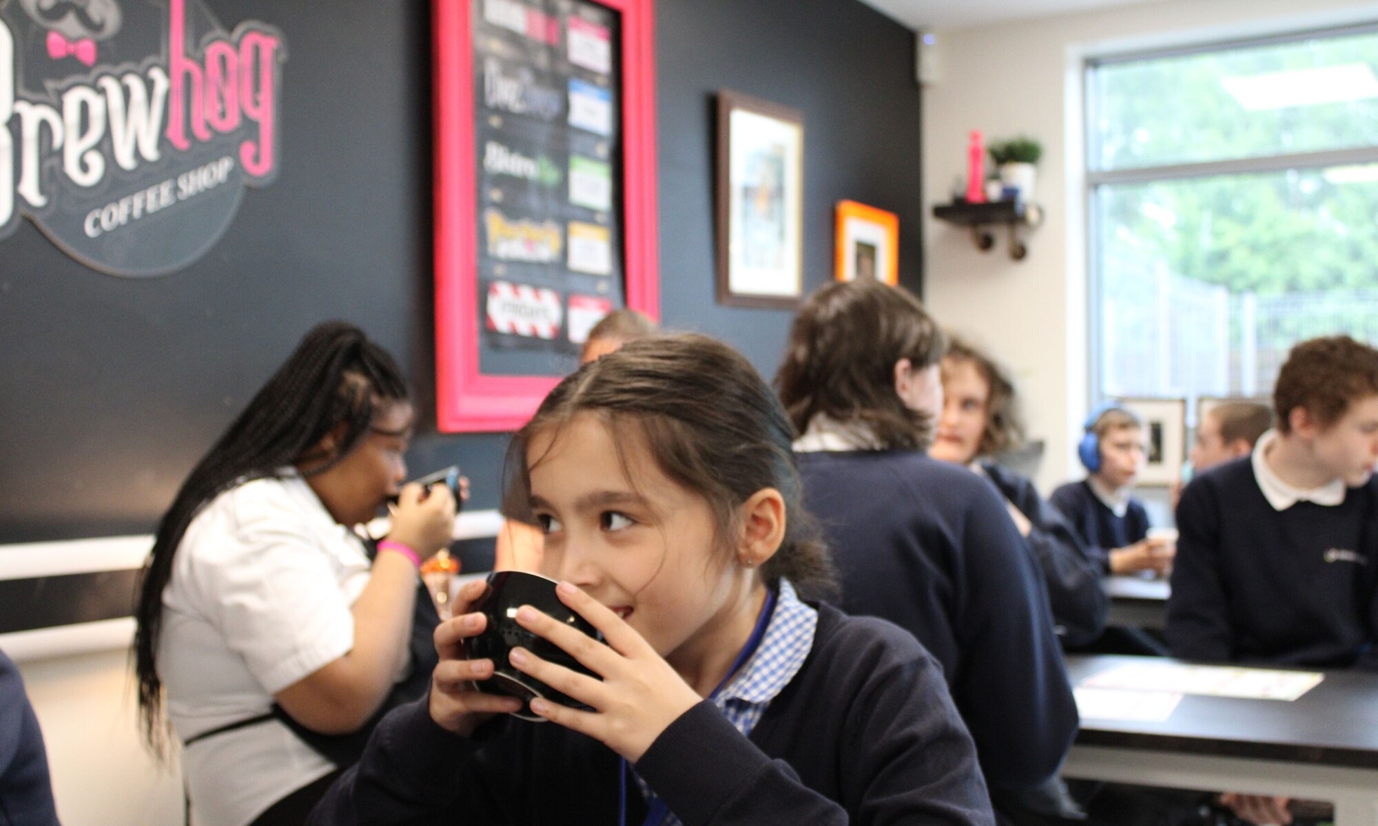 Orchard House High School pupils drinking a hot drink