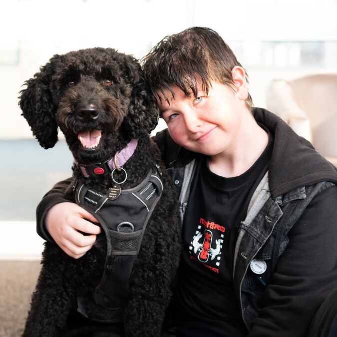 Robert Ogden School Student with Therapy Dog