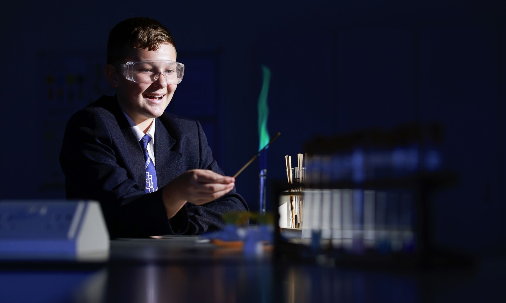 Clacton County High Student doing science experiment