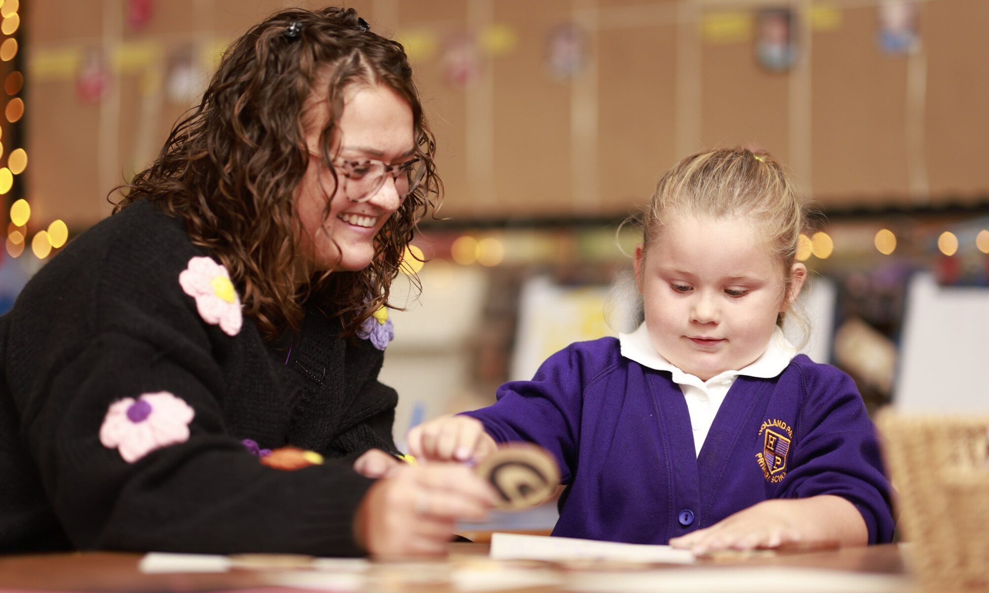 Holland Park Primary School - Pupil and teacher in lesson
