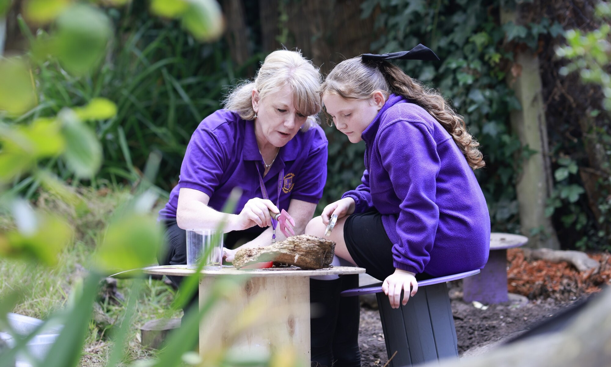 Holland Park Primary School - Pupil and teacher gardening