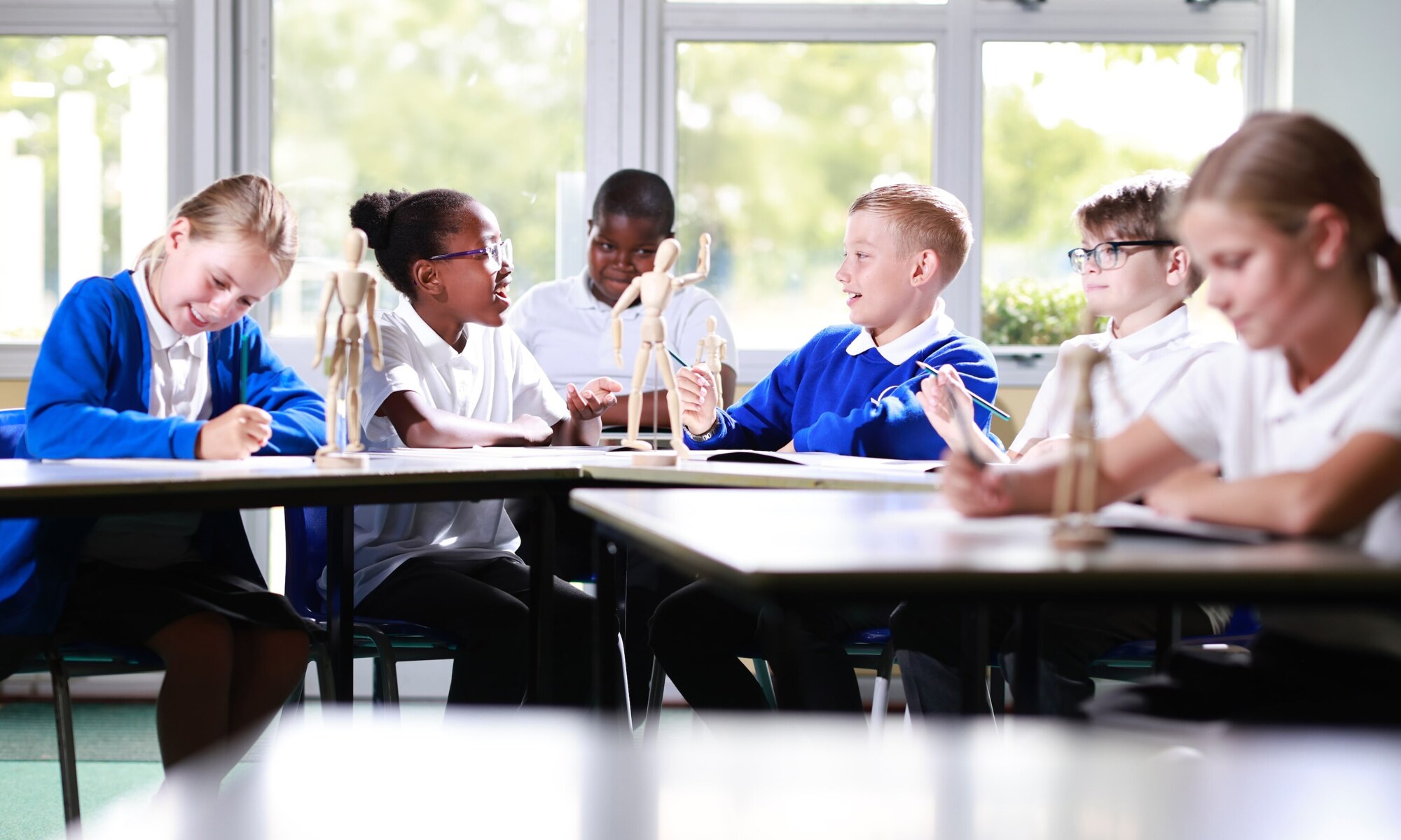 Students exchanging ideas during class