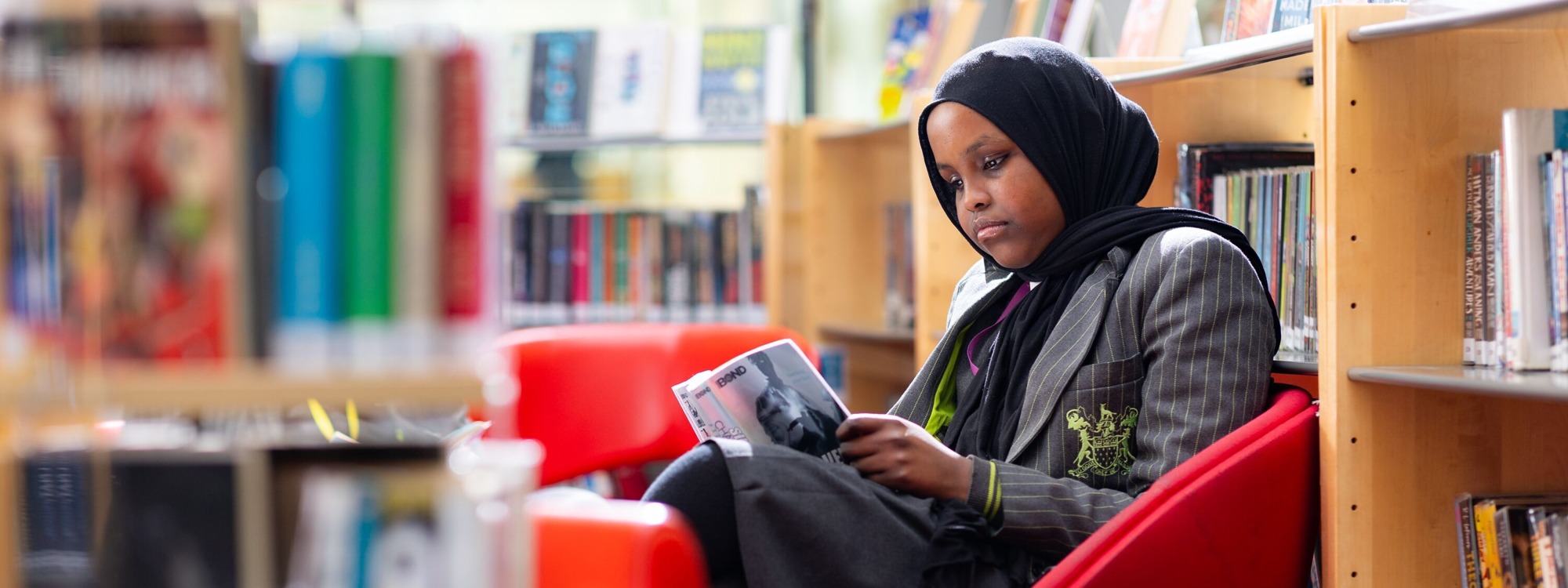Skinners Academy Hackney Student Reading in Library
