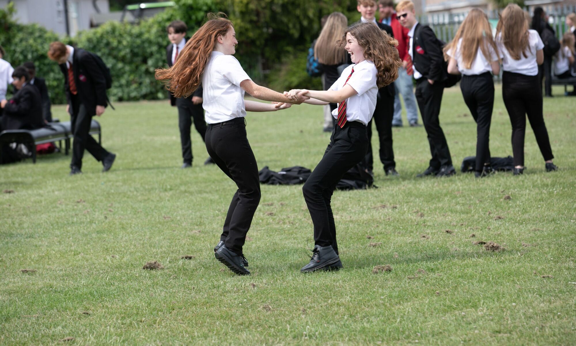 The eastwood academy students in the school grounds